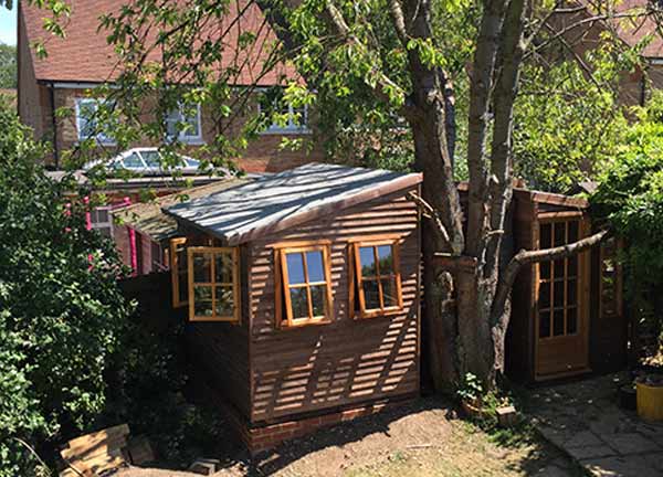 B16-3 garden game room built around the tree