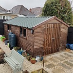 Garden storage shed with metal roof