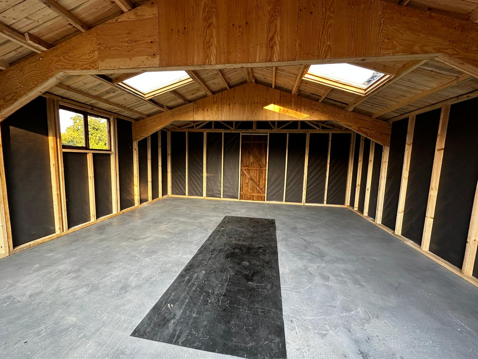 J56-hunter-garage-bifold-doors-breather-lined-with-roof-lights