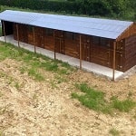 Four stables with tack and hay store
